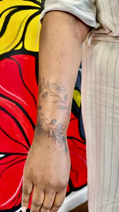 Cover-up tattoo on the forearm